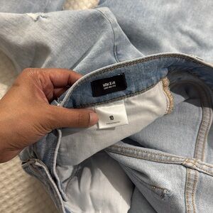 Express Super High Waisted Ripped Raw Hem Mom Jeans.  Size 10